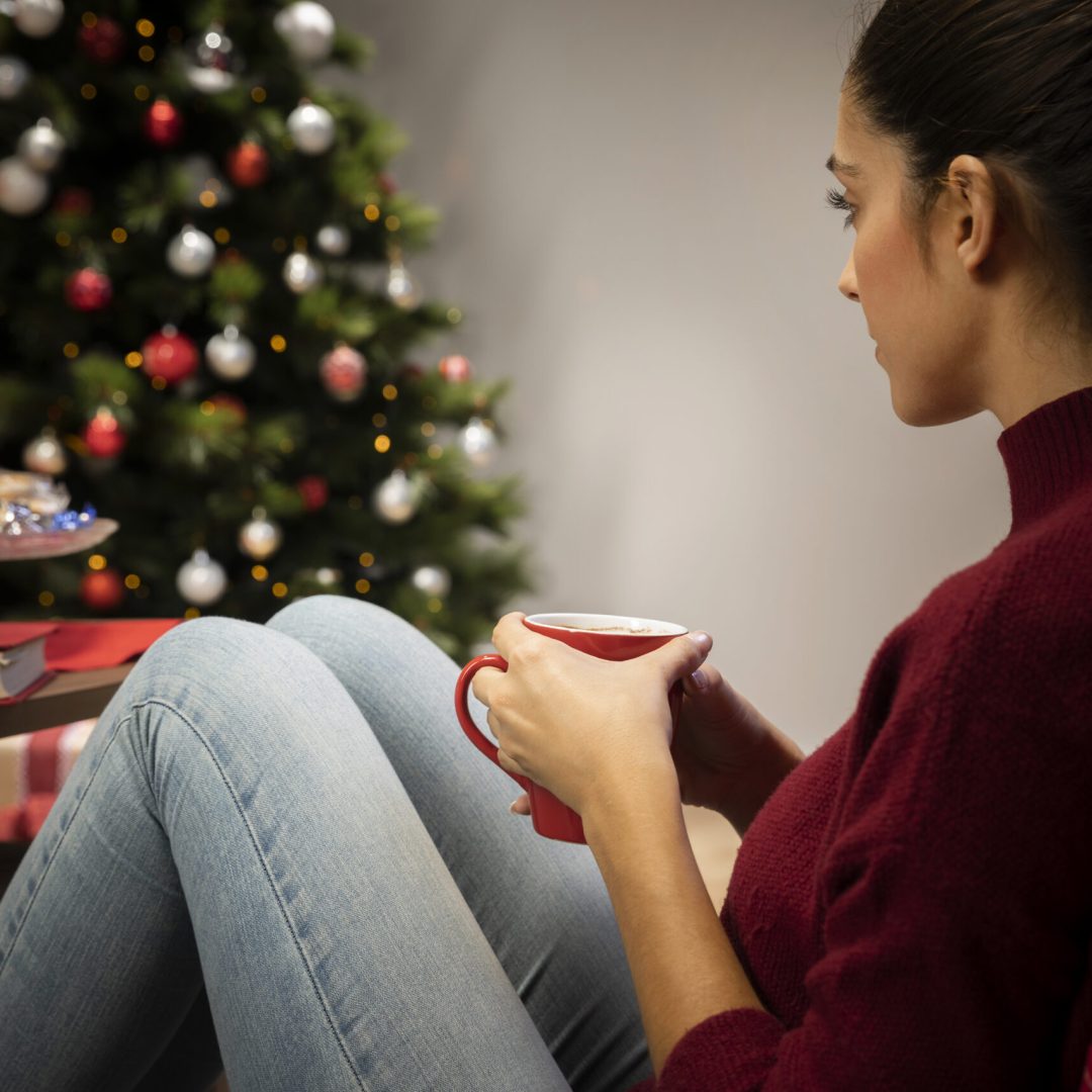 female-looking-cup-with-christmas-background